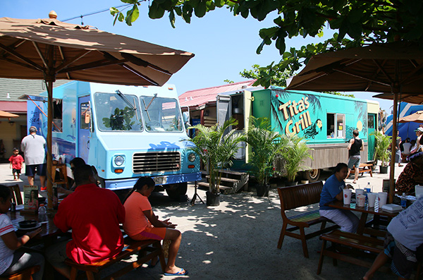 picture of Sam Choy's Seafood & Poke truck and Tita's Grill