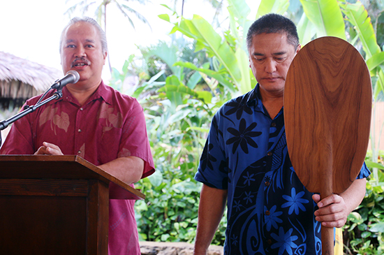 Presentation of hand-carved Hawaiian paddle - photo courtesy of Mike Foley