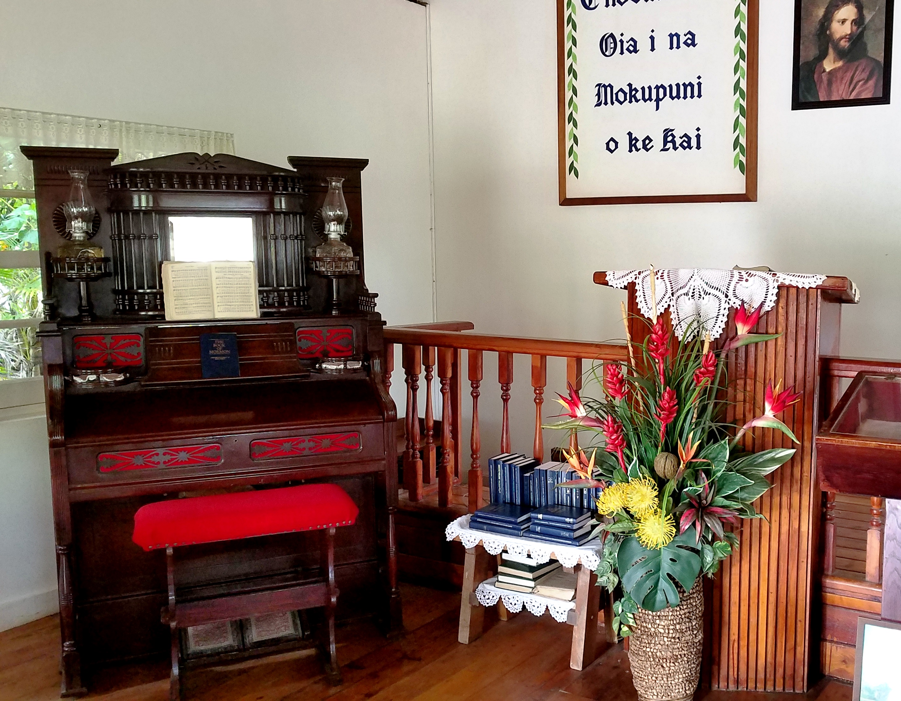 Interior photo of Mission Home at the Polynesian Cultural Center including the Etwey Organ and pulpit