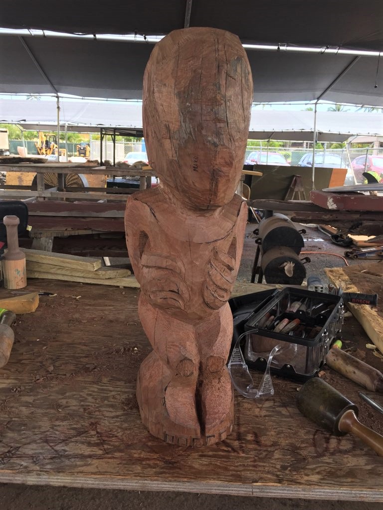 ohia wood carving in progress to become a Teko-Teko tiki in the Maori Village at the Polynesian Cultural Center