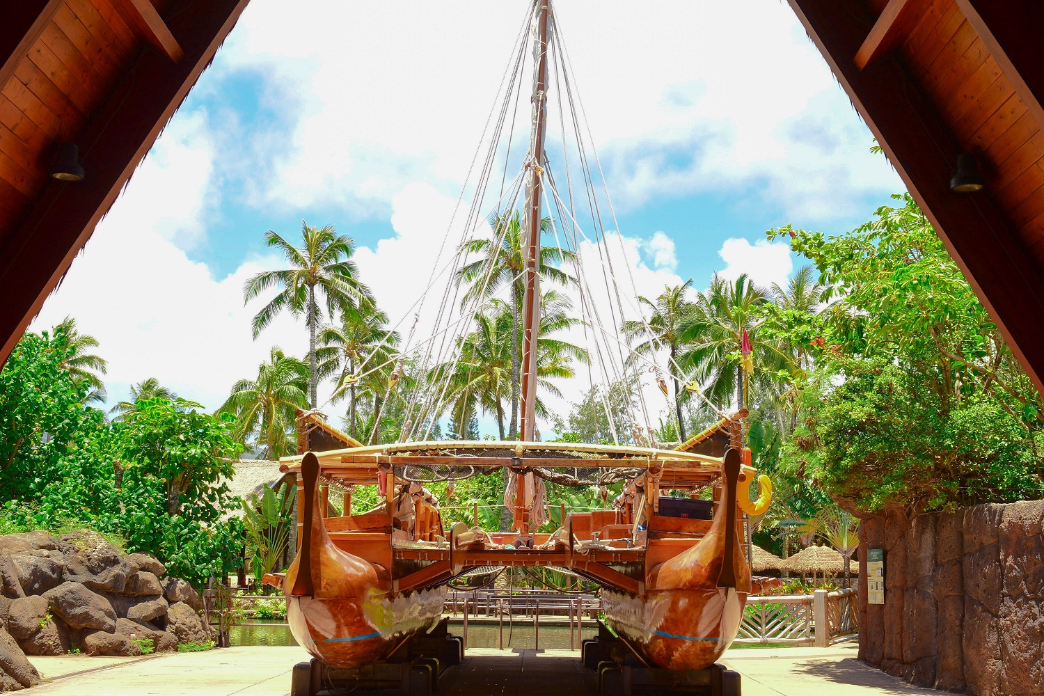 photo of the Iosepa, a doubled hulled sailing vessel used for teaching ancient Polynesian navigational skills. When it is dry-docked, it is housed on the Polynesian Cultural Center's campus