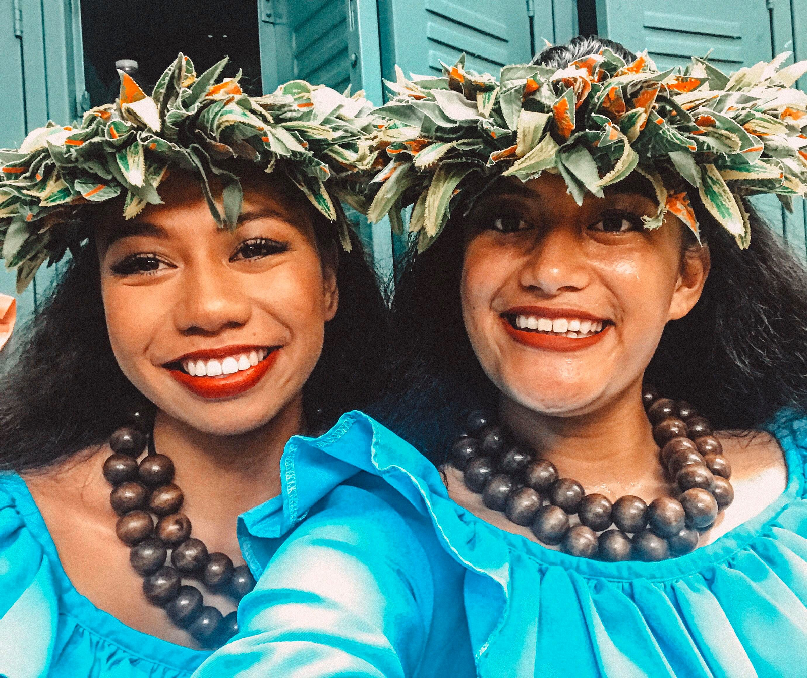 Two women preparing to dance at the Polynesian Cultural Center