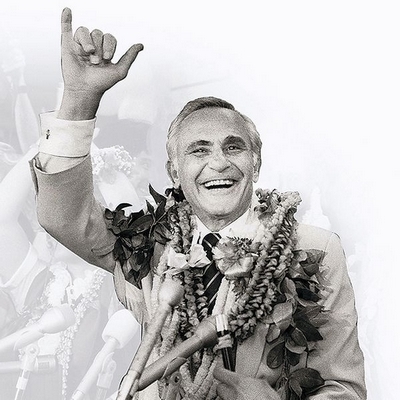 Photo of Frank Fasi, former mayor of Honolulu, waving the shaka sign