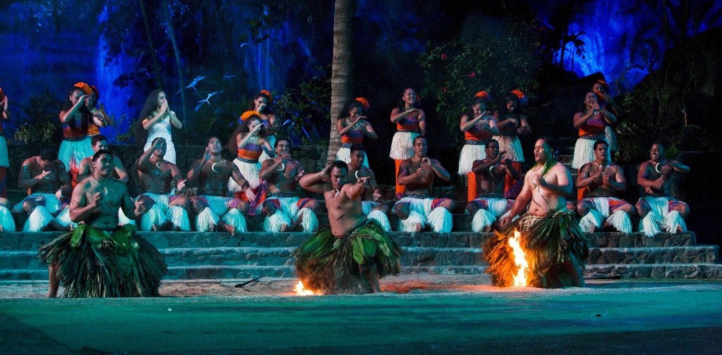 image of firewalkers performing at HA: Breath of Life at the Polynesian Cultural Center. The Center plans to fully reopen in March, 2021.