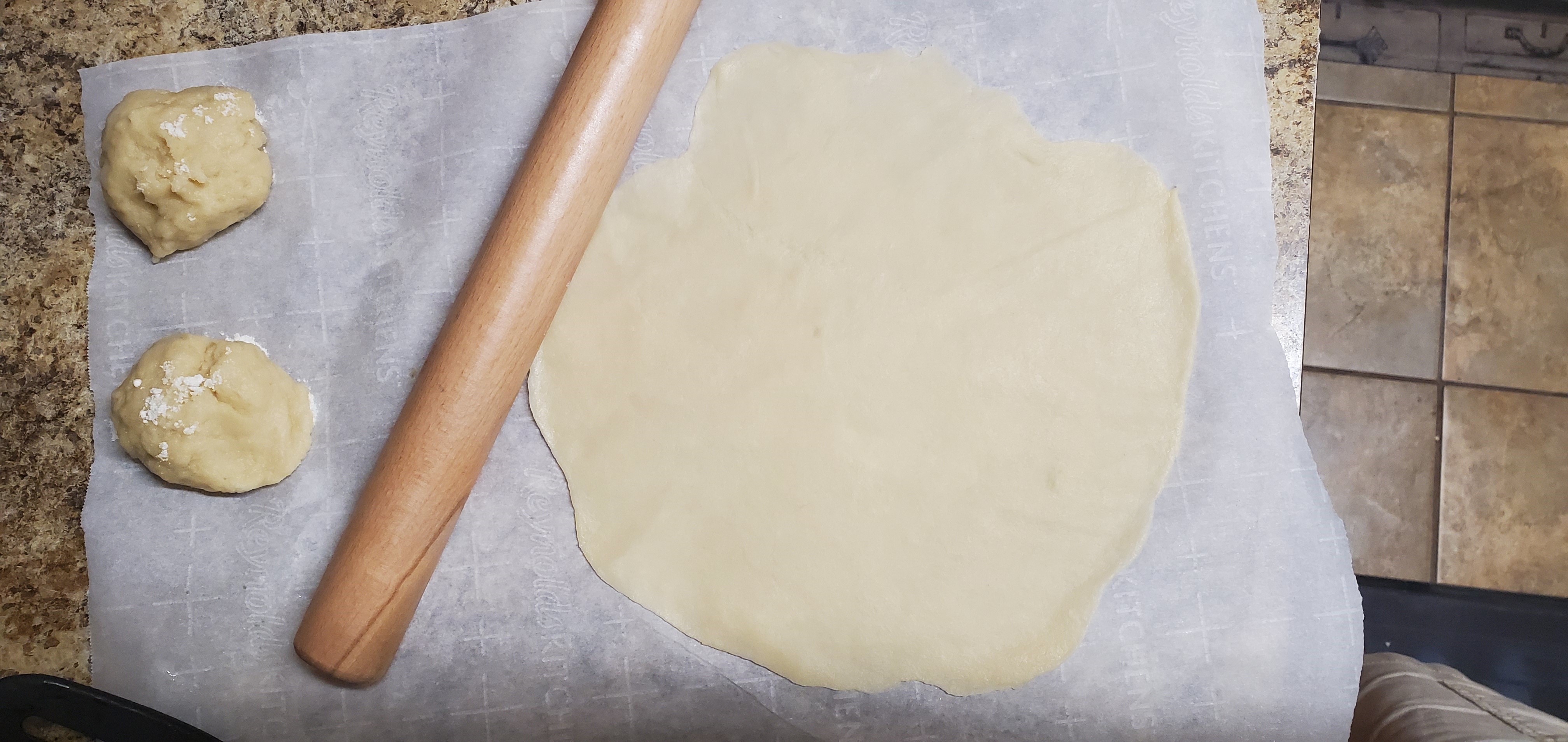 Photo of rolled out dough and rolling pin