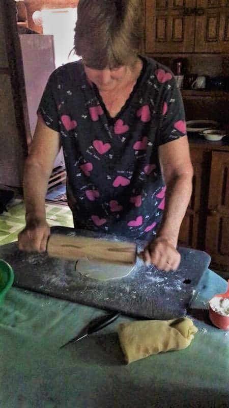 photo of woman making roti, an Indian flat bread popular in Fiji