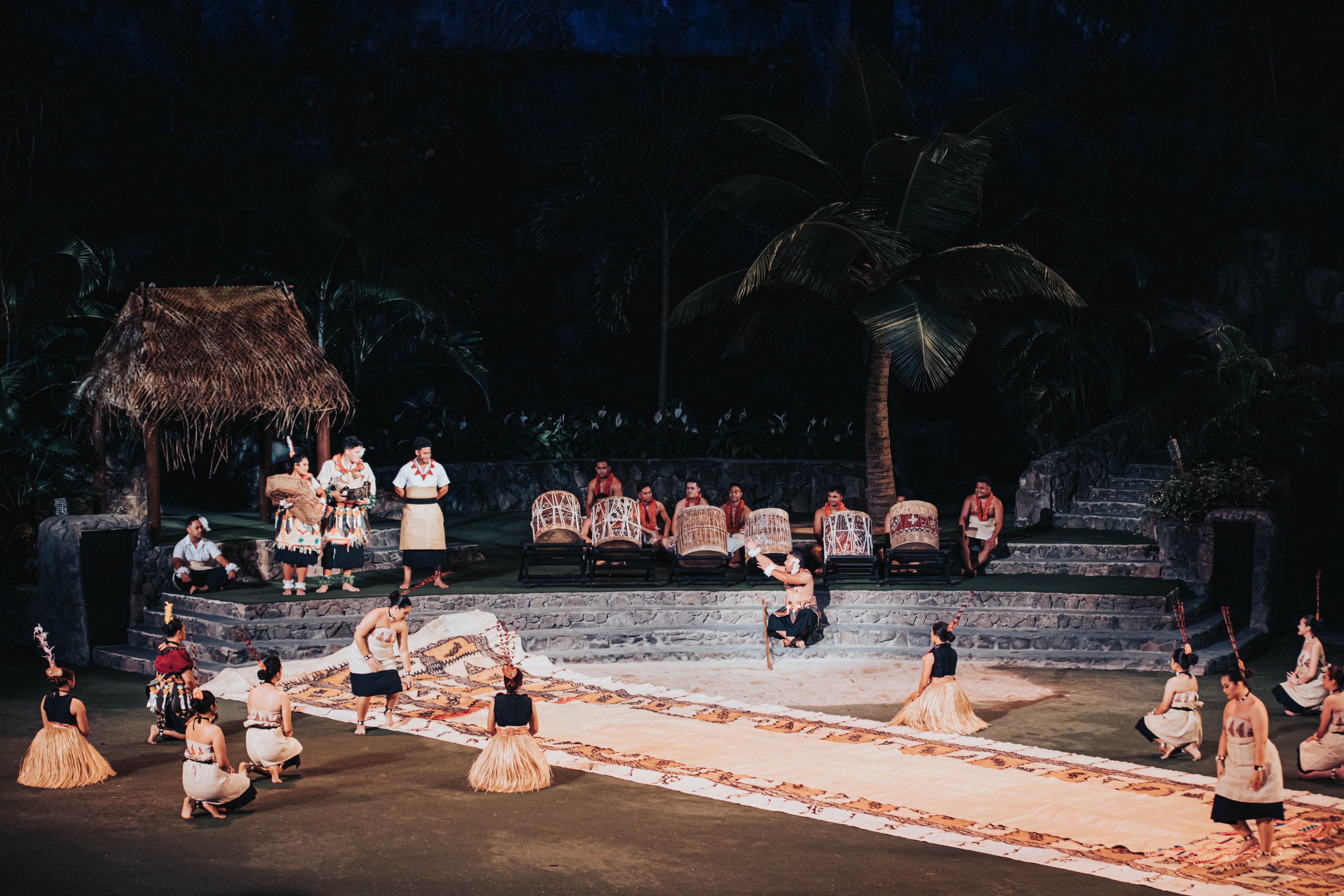 Polynesian performers unroll a massive Tongan tapa at HA: Breath of Life