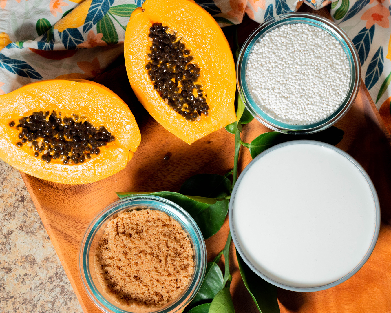 There are 5 basic ingredients that you need to make supoesi: ripe papaya, tapioca pearls, sugar, coconut milk, water, and lemon leaves (natural fragrance).