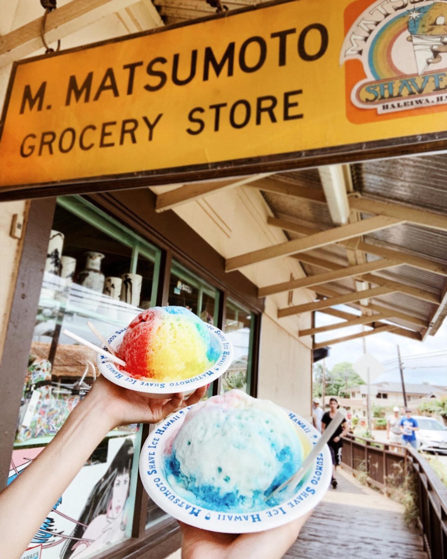 Photo of 2 bowls of Matsumoto shave ice taken in from of M. Matsumoto entrance sign. One of the 5 things to do with your children 