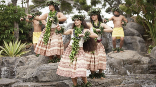 photo of hula dancers at the Polynesian Cultural Center. Mahalo i ka ʻāina is how to respect the culture