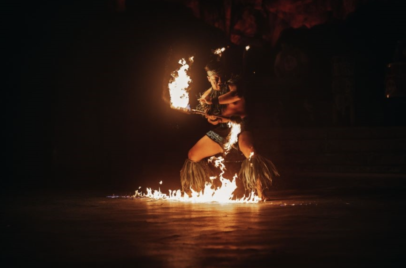 Mose Lilo performing his fireknife routine and spins the knife so fast he lights the floor on fire