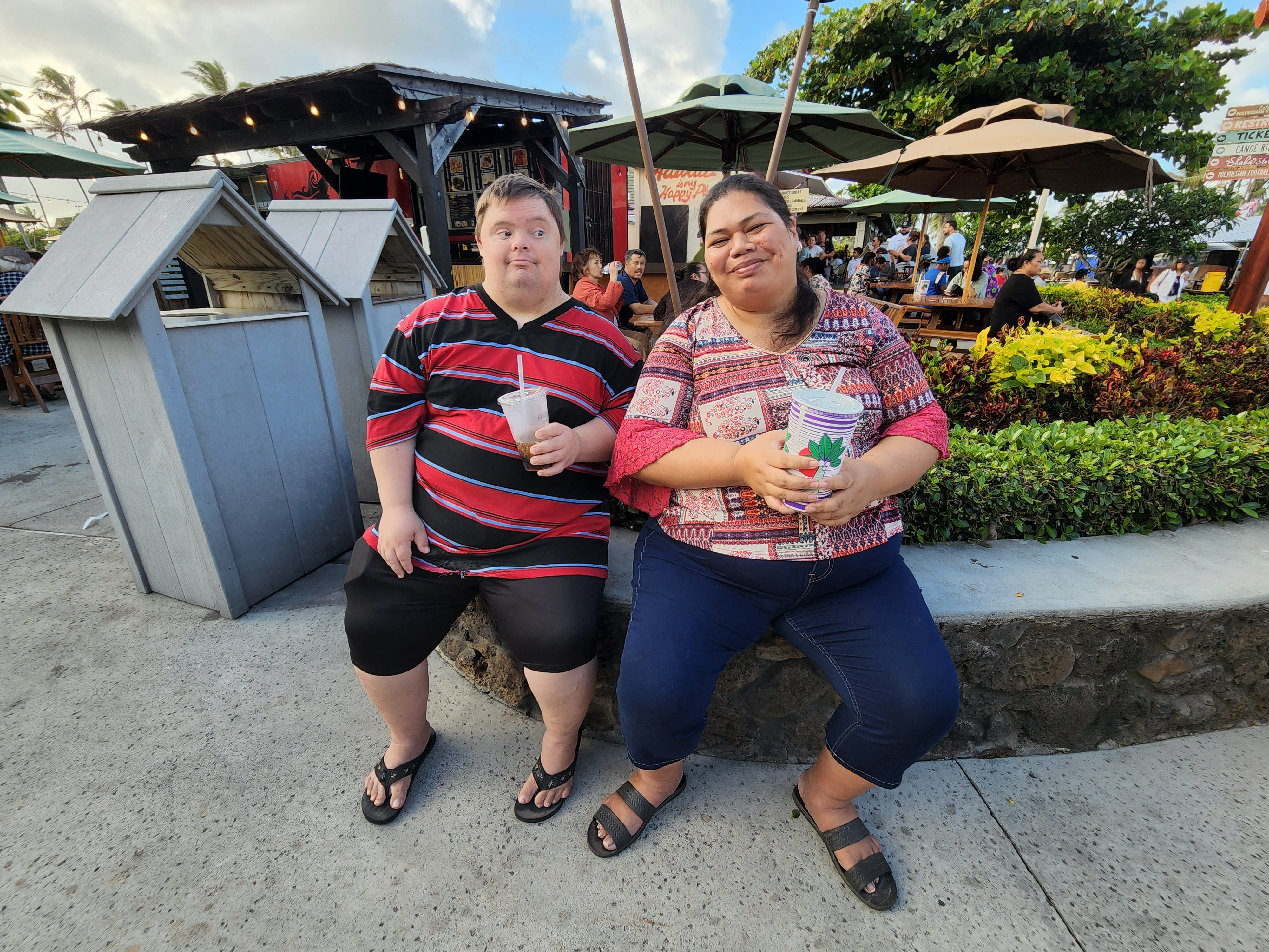 photo of David and Violet Cold at Hukilau Marketplace enjoy the 4th of July live band