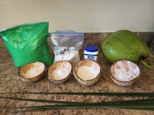 The photo shows all the ingredients to make authentic Tahitian coconut bread.