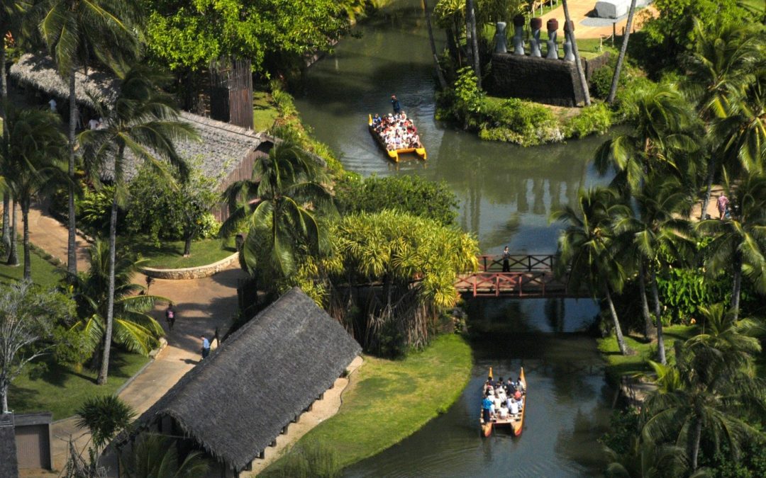 lead image: lagoon drone with canoes