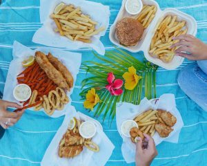 image of fish, chips, burgers, and sauces from the local Kiwi Style Fish & Chips food truck