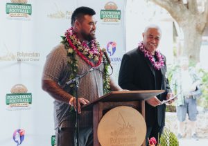 photo of Iupati giving a speech at the 2023 Polynesian Football Hall of Fame