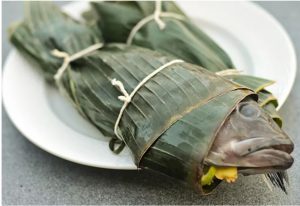 fresh fish wrapped in banana leaf