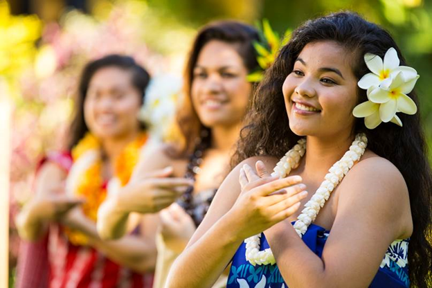 image of beautiful Hawaiian women showcasing the Hawaiian word pono with their beautiful smiles 
