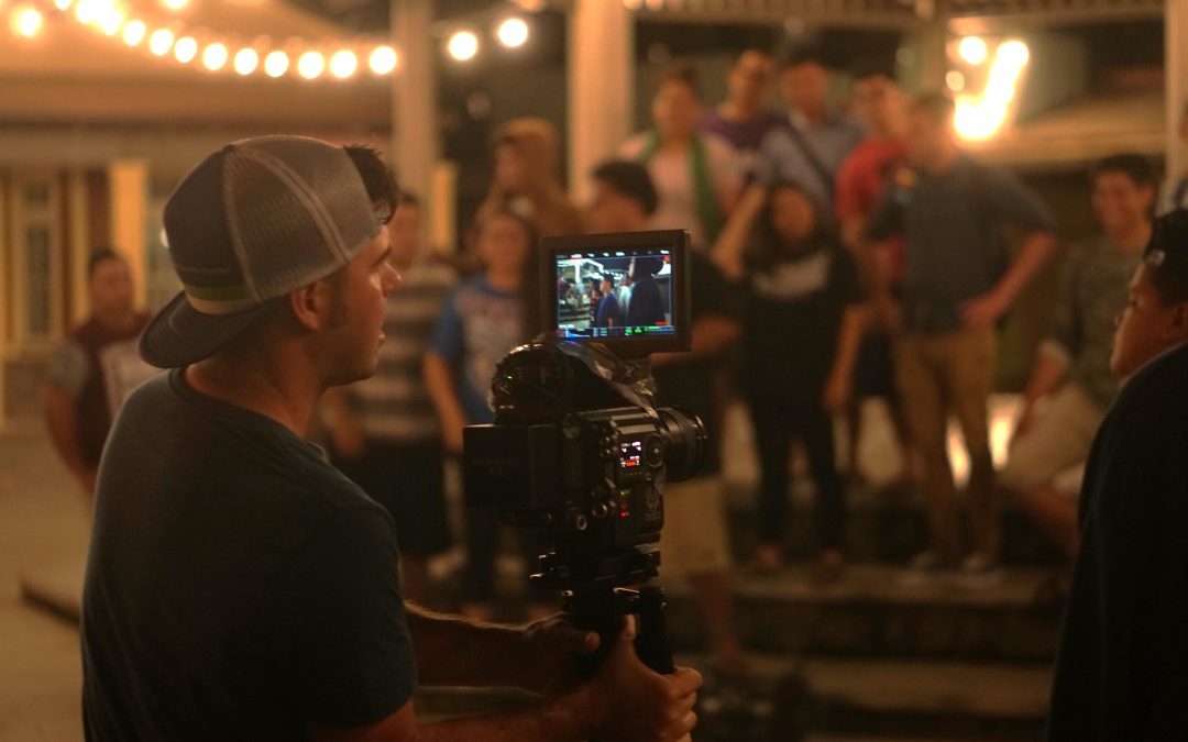photo of Devin Graham/Supertramp filming at the Hukilau Marketplace