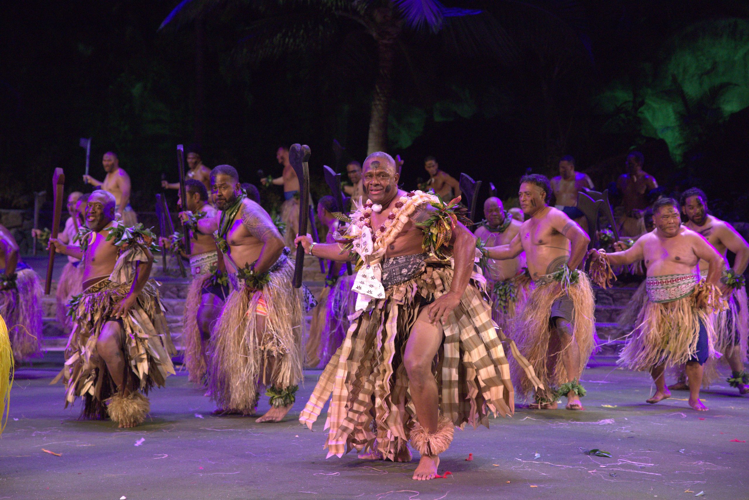 Fijian men performing