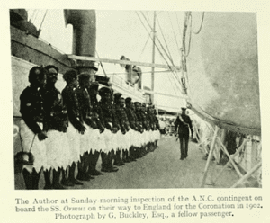 Fijian men in British military uniforms, lined up by a ship