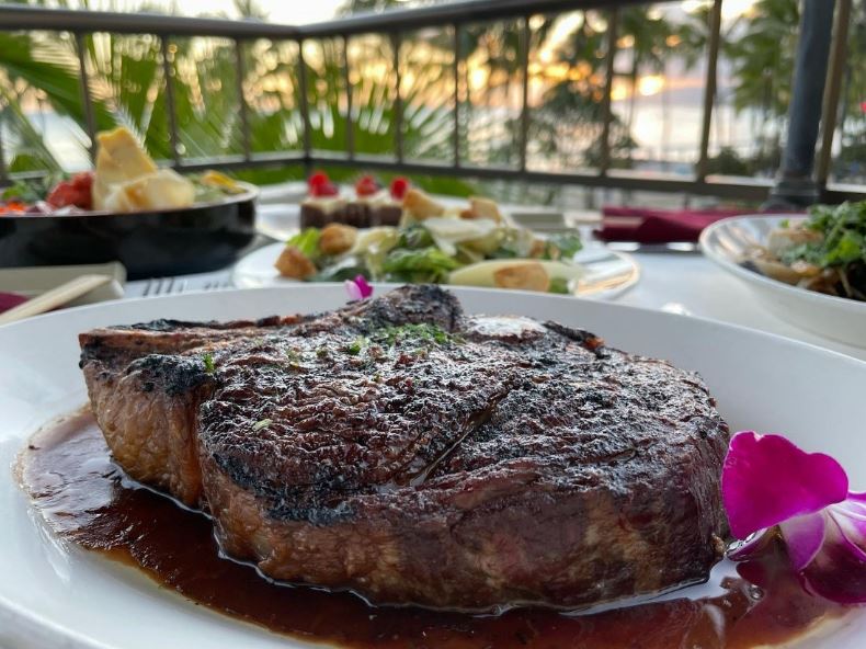 A steak on a plate.