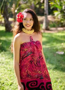 Island girl in red sarong